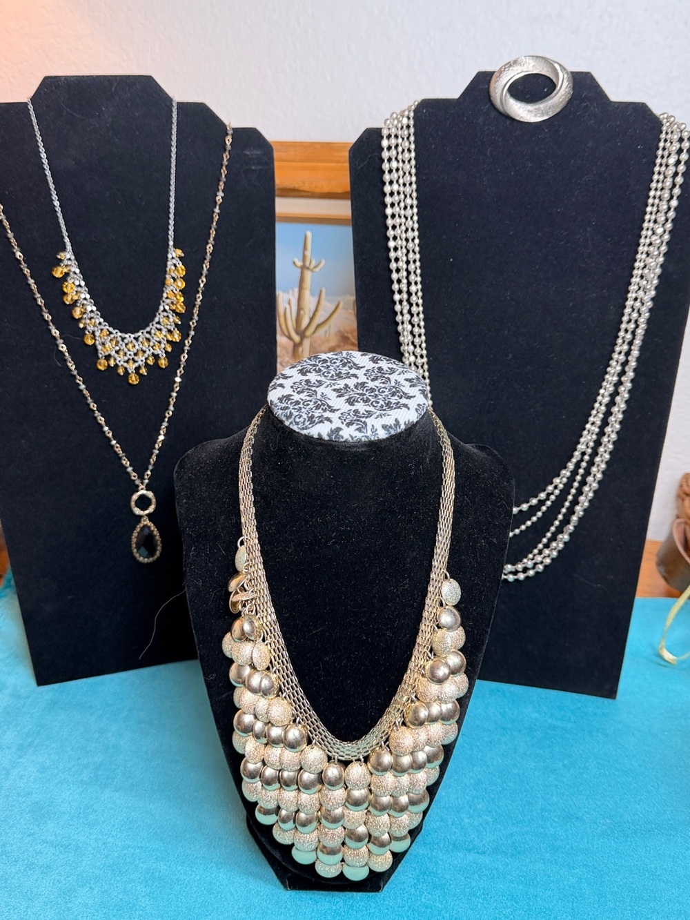 Lot of costume jewelry includes a Layered Gold-Tone Statement Bib Necklace